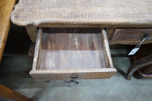 An 18th century style French provincial pine two drawer side table, width 79cm, depth 49cm, height 76cm